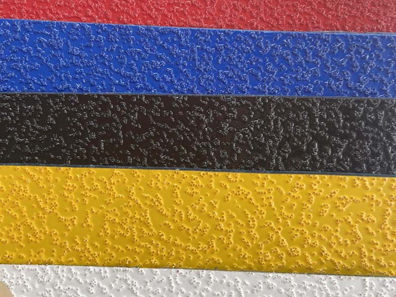 Preformed road marking strip